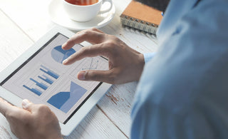 blue graph and pie chart indicating buy and hold investment
